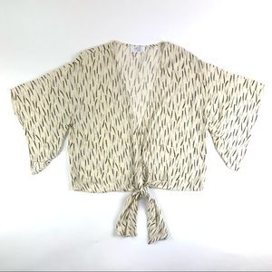 MOD Boutique Feather Print Wrap Tie Bell Sleeve Blouse